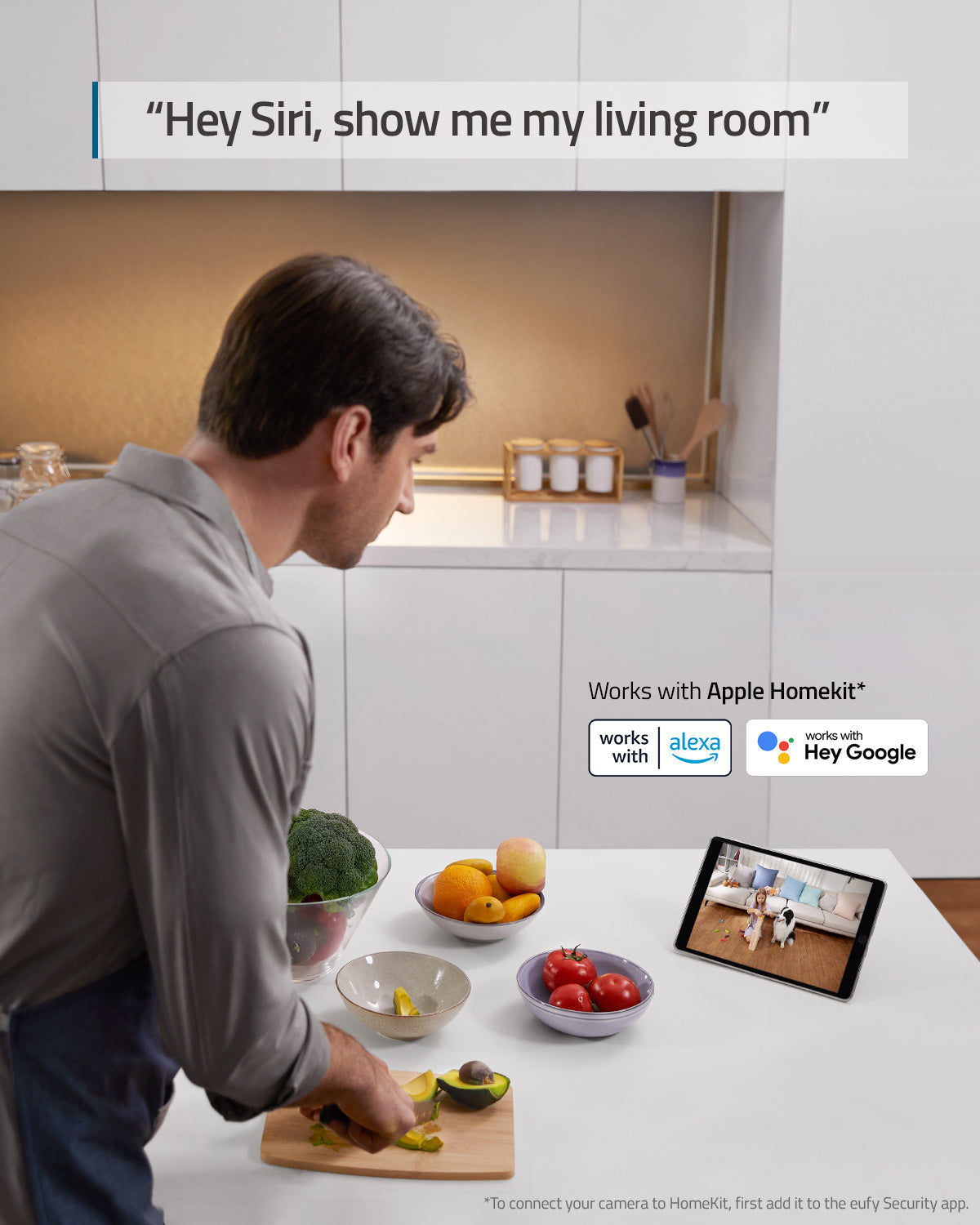 eufy man preparing food with kitchen tablet for monitoring